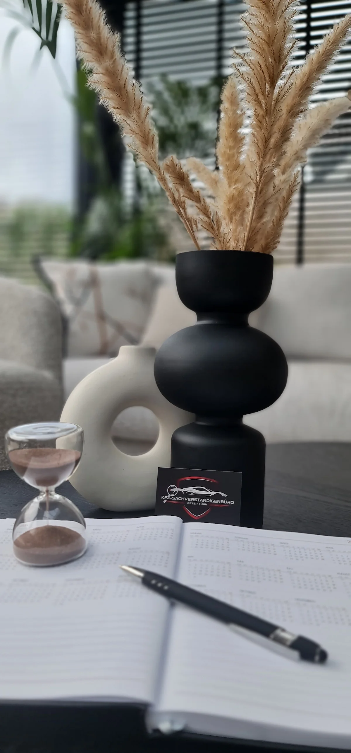 KFZ-Sachverständigenbüro - Peter Kühn - Sanduhr